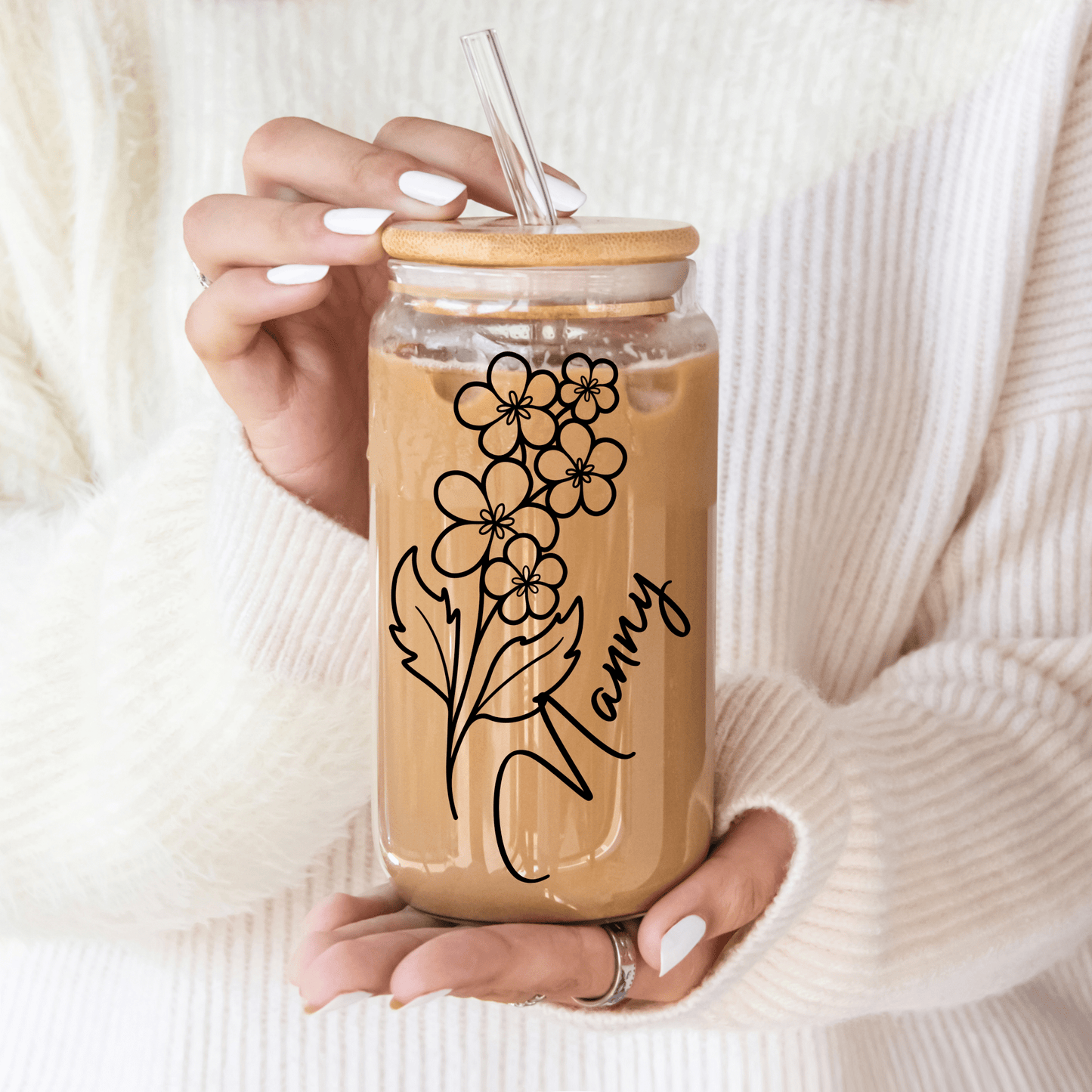Detailed birth month flower design on personalised glass tumbler