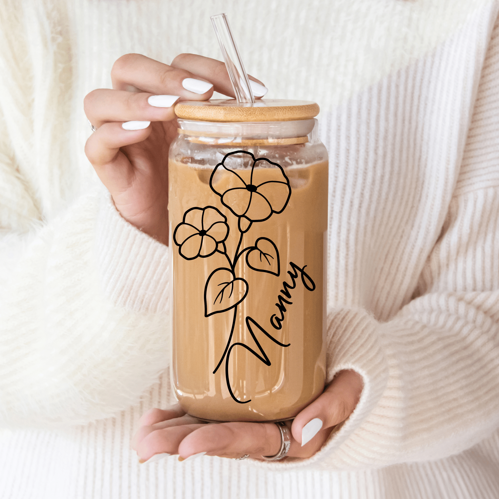 Detailed birth month flower design on personalised glass tumbler