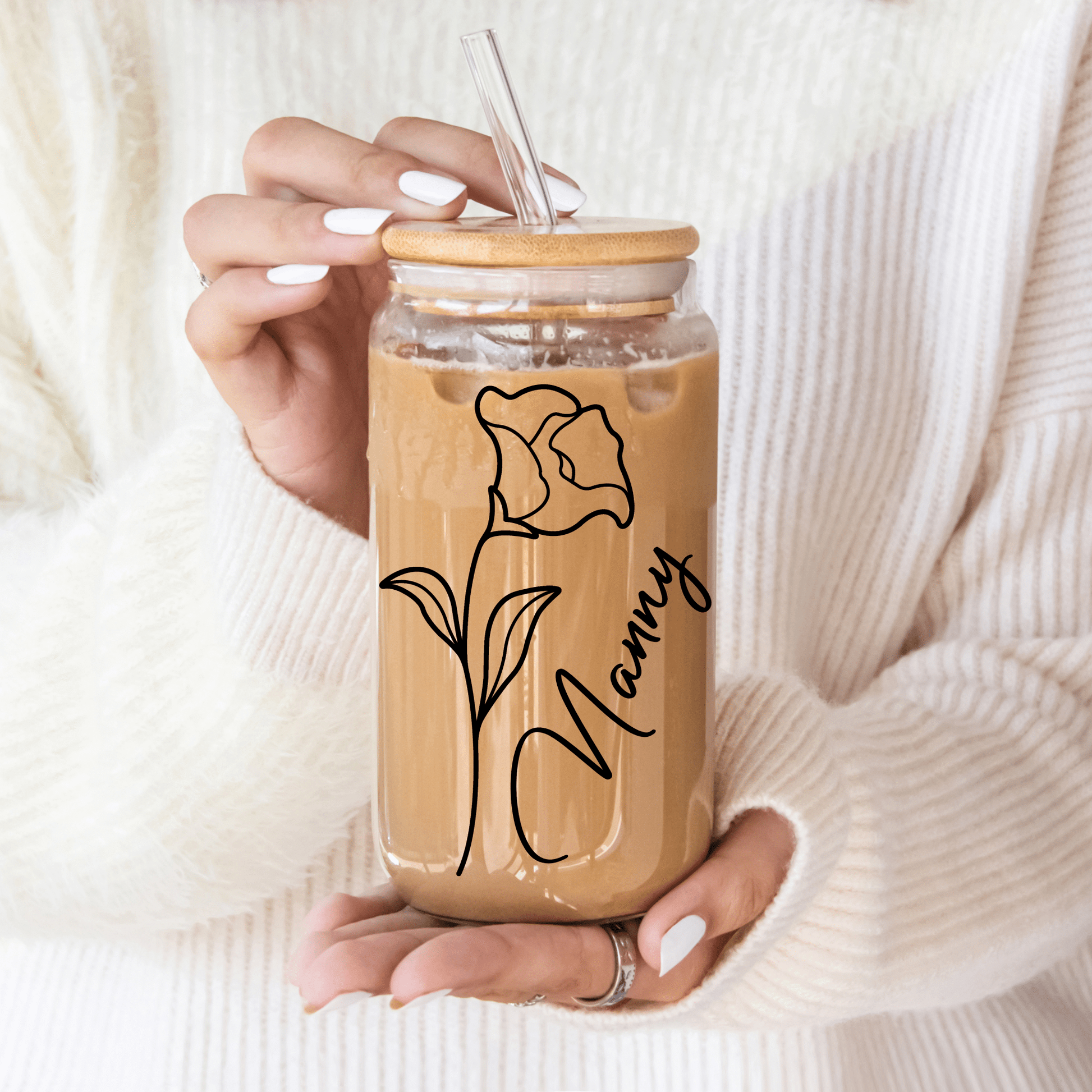 Detailed birth month flower design on personalised glass tumbler