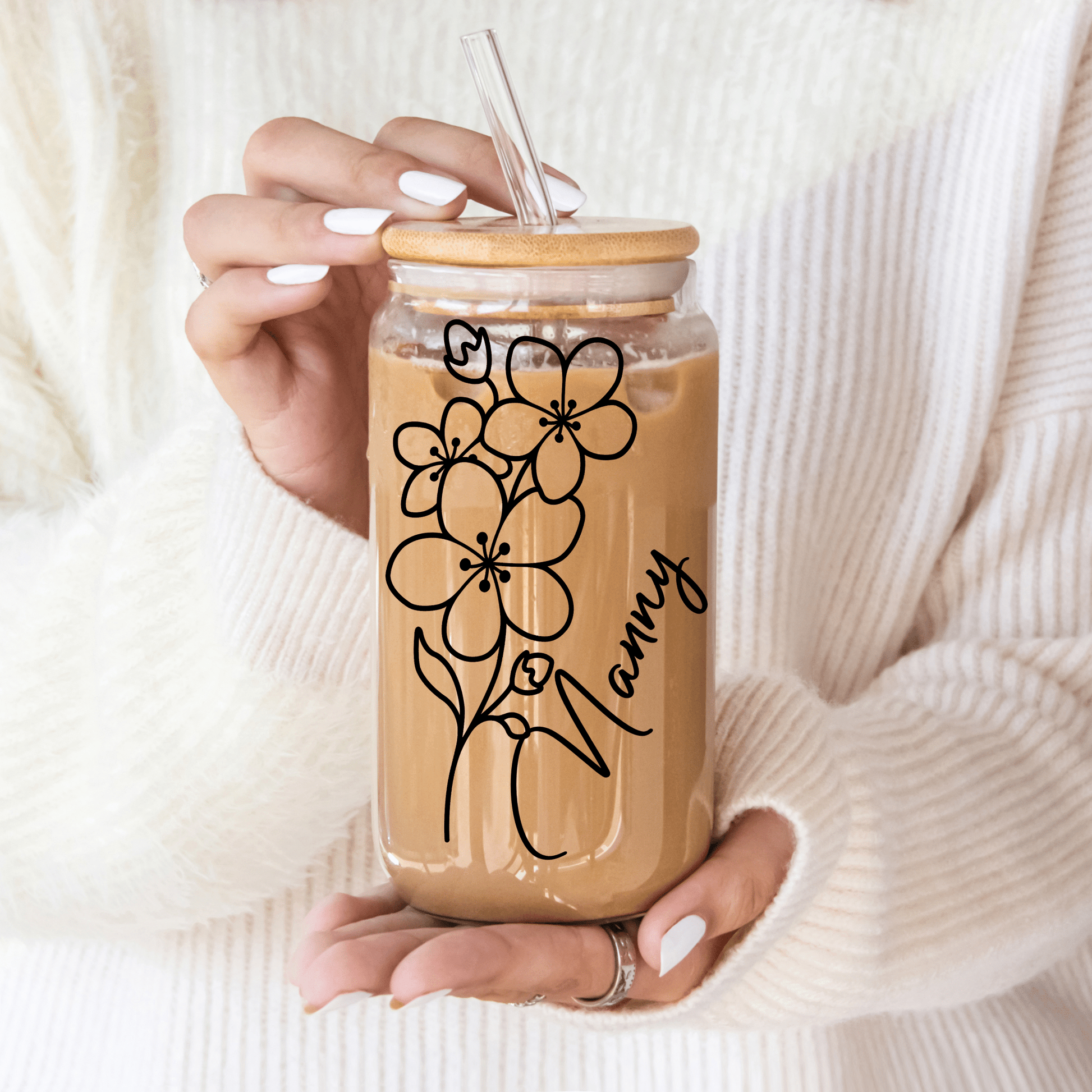 Detailed birth month flower design on personalised glass tumbler